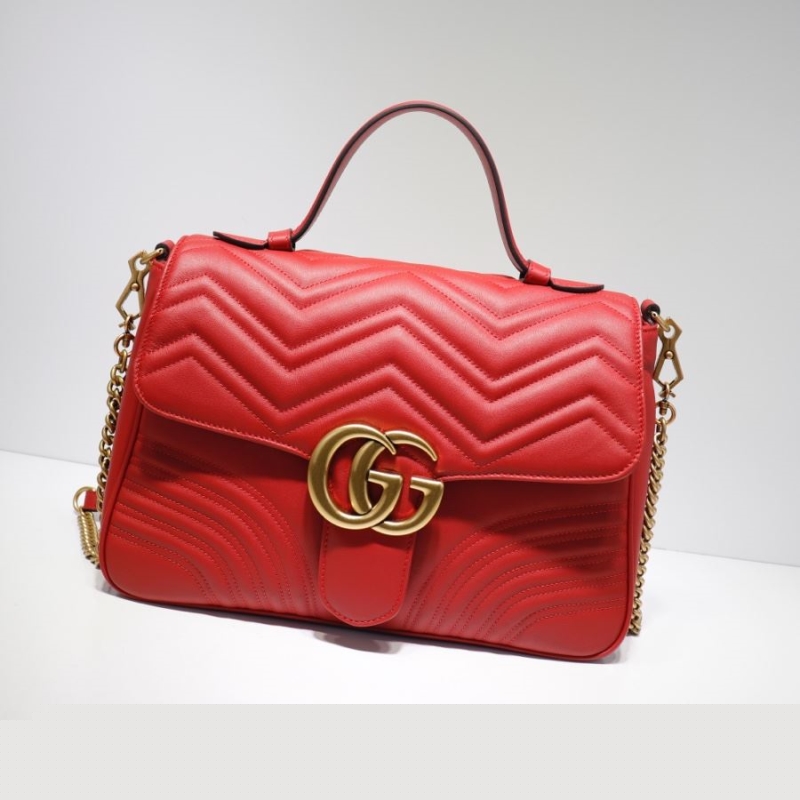 G*u*i top handle bags
